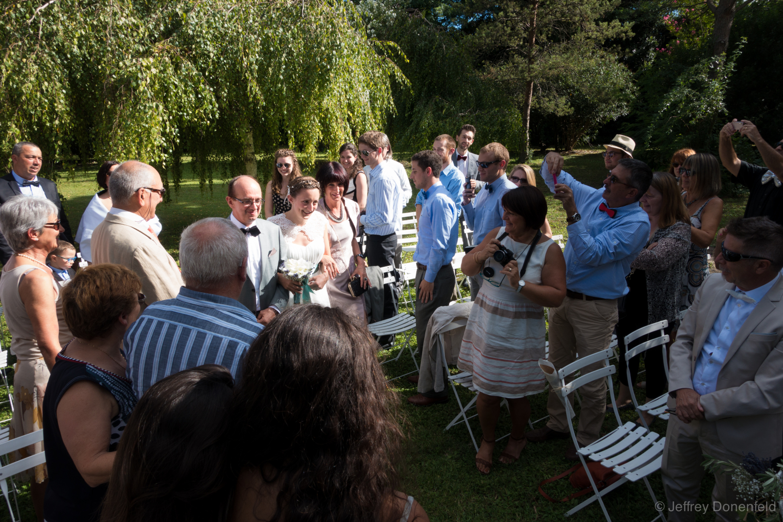 Beautiful wedding ceremony, on the grounds of a historic farmhouse. 