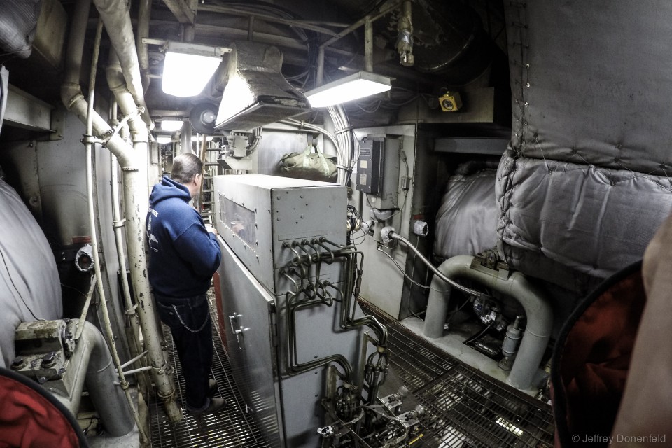 Making our way throuhg the engine room. Here you can see the thermal blankets surrounding the intakes of two of the turbines. This is the true heart of the ship.