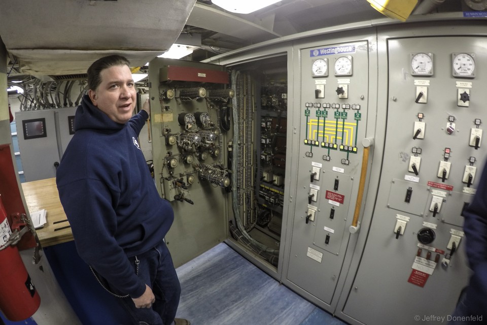 On the other side of the engine control room, the backup engine control system is the original Westinghouse system. Here, we're opening the original cabinet to inspect the original engine control, rheostats, etc.