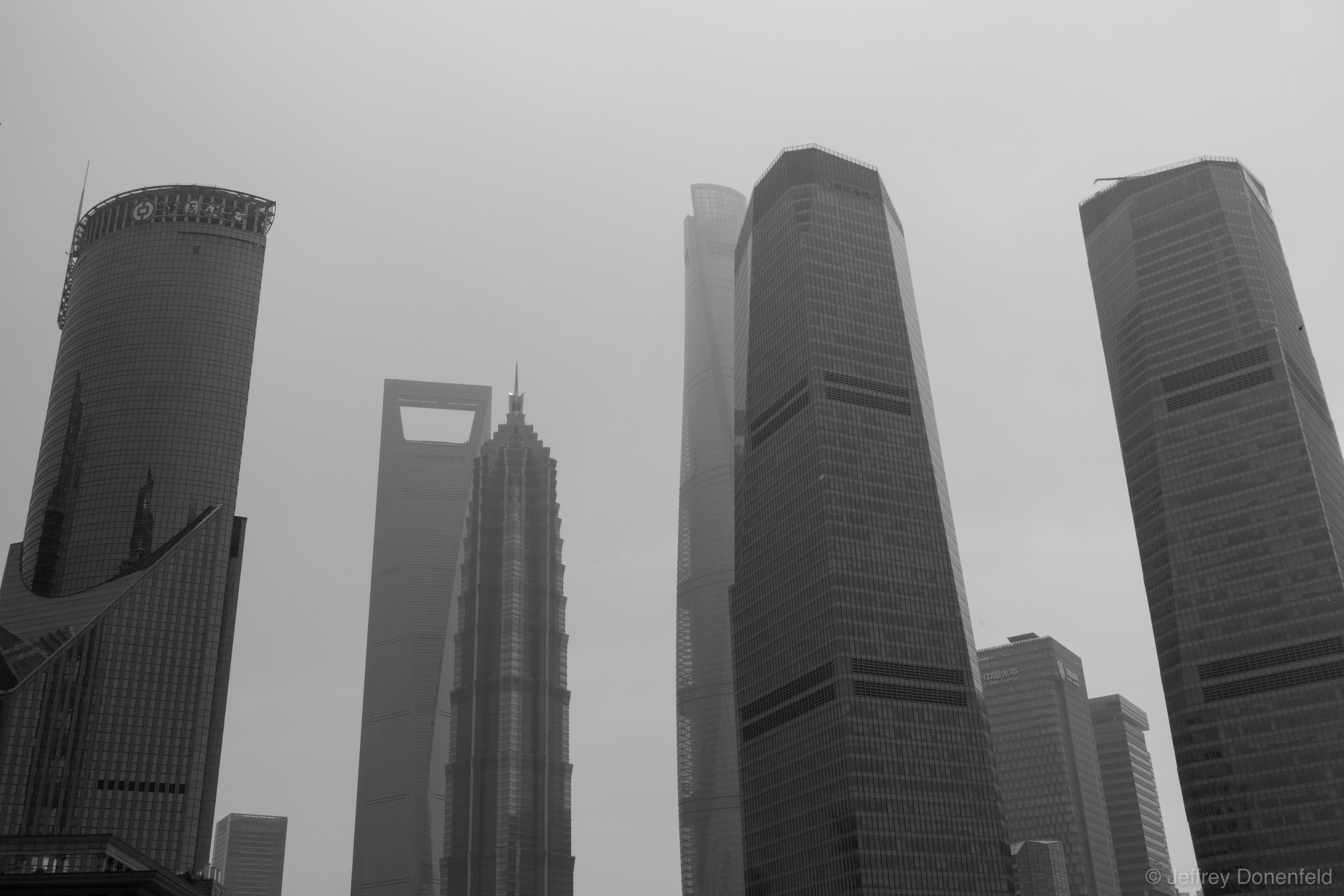 In the business center of Pudong, skyscrapers are huge, and being built as fast as possible. Looming in the back of this photo is the Shanghai tower, the tallest building in China and the second tallest in the world.