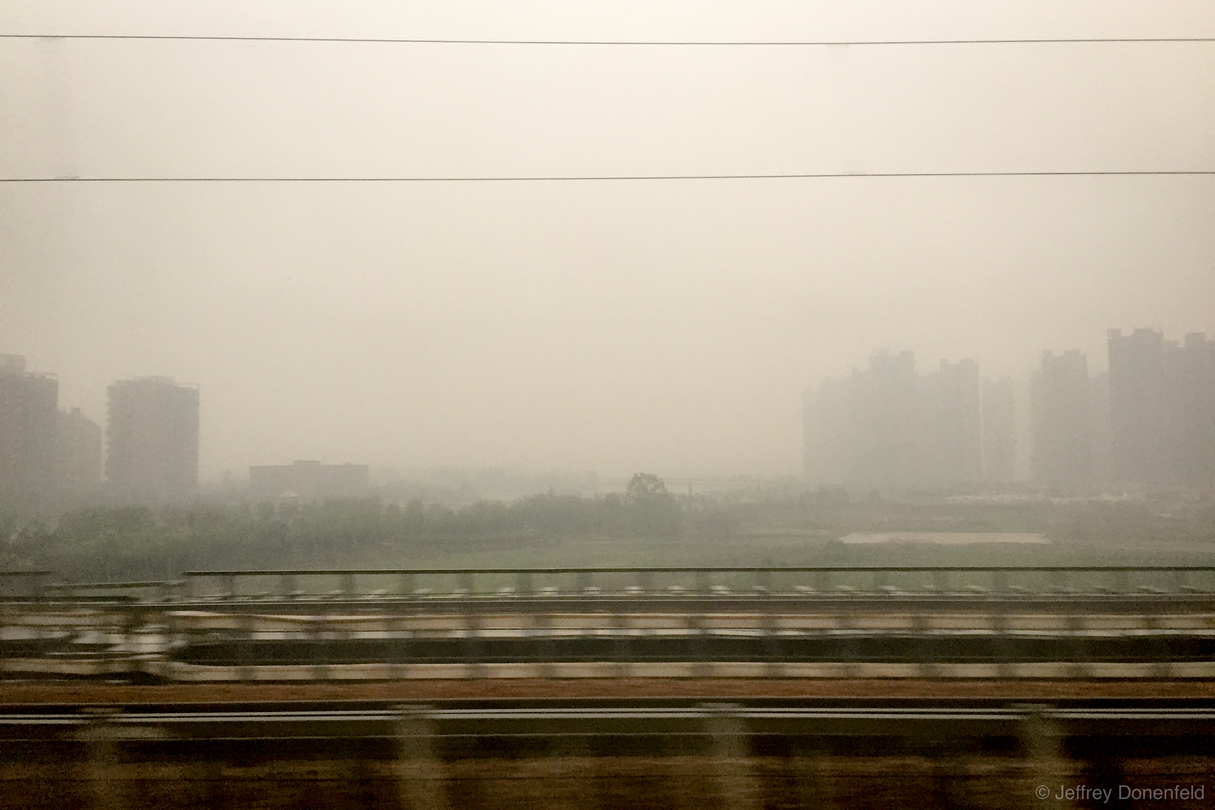 I took a train from Beijing to Xi'an, and during the journey, the pollution and smog from Chinese industry was incredible. Visibility barely extended to the buildings next to the train track, and as I stared out the window in disgust, I could see individual clouds of pollution washing over China.