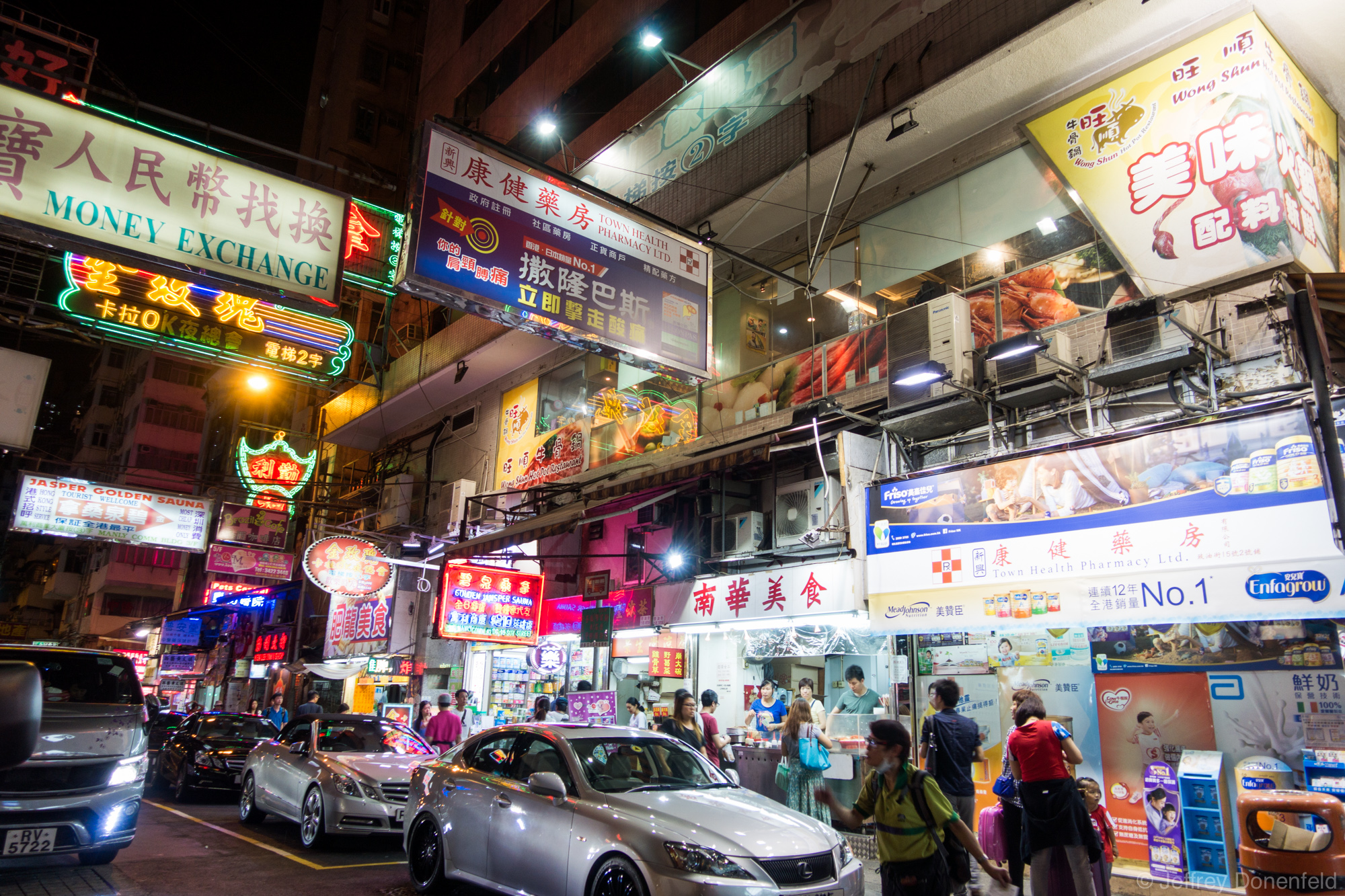 Downtown Hong Kong, with dense signs, people everywhere. – Jeffrey ...
