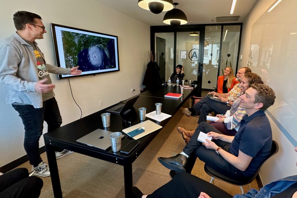 Jeffrey Donenfeld, Alana Vaughn-Phillips, Mike Connolly judge startup pitches from the Young Transatlantic Innovation Leaders Initiative Fellowship Program.